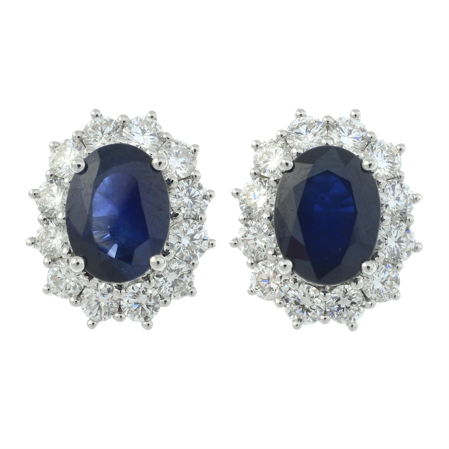 A pair of 18ct gold sapphire and brilliant-cut diamond cluster earrings. - Image 2 of 3