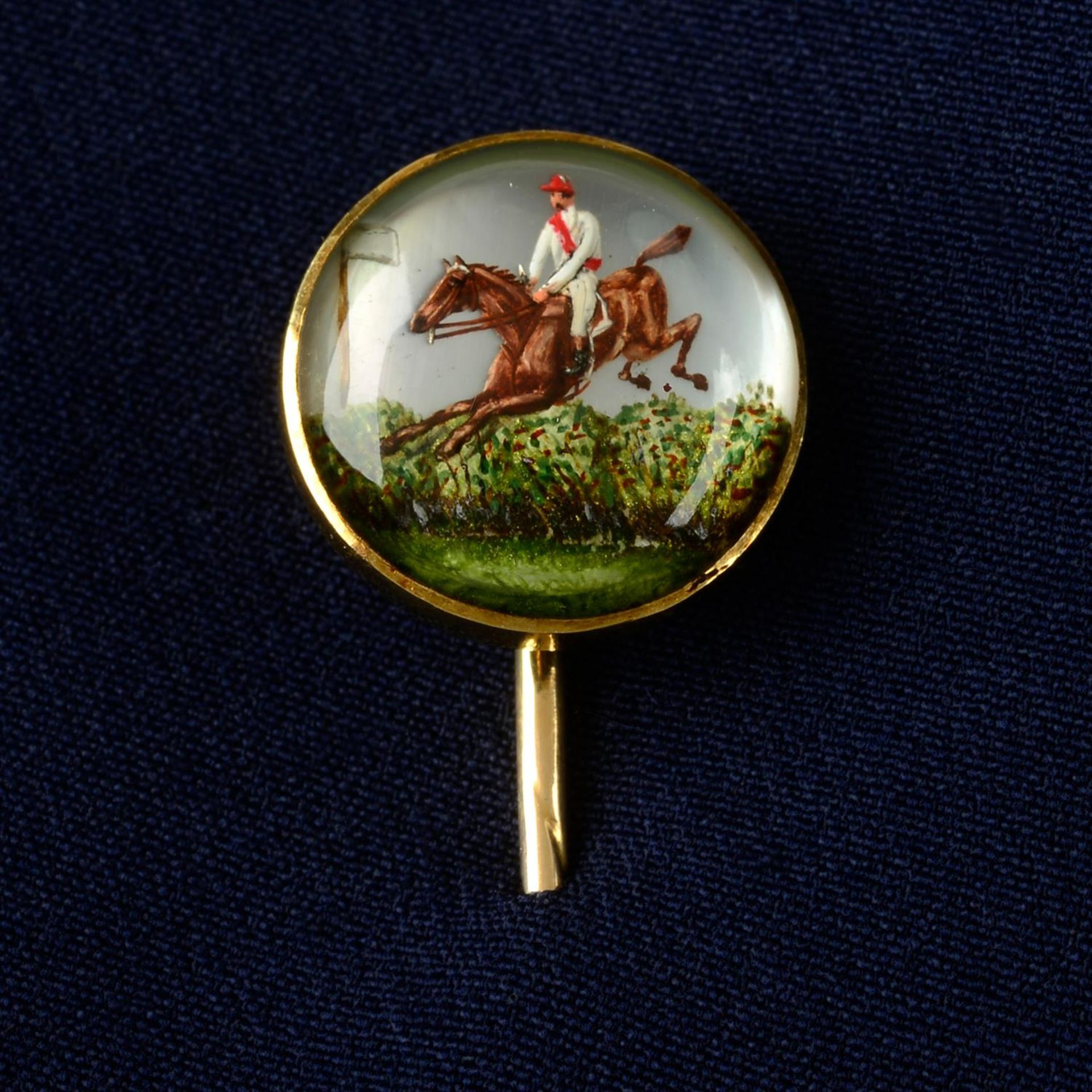 A late Victorian gold, reverse-carved and painted stickpin, depicting 1883 Grand National winner