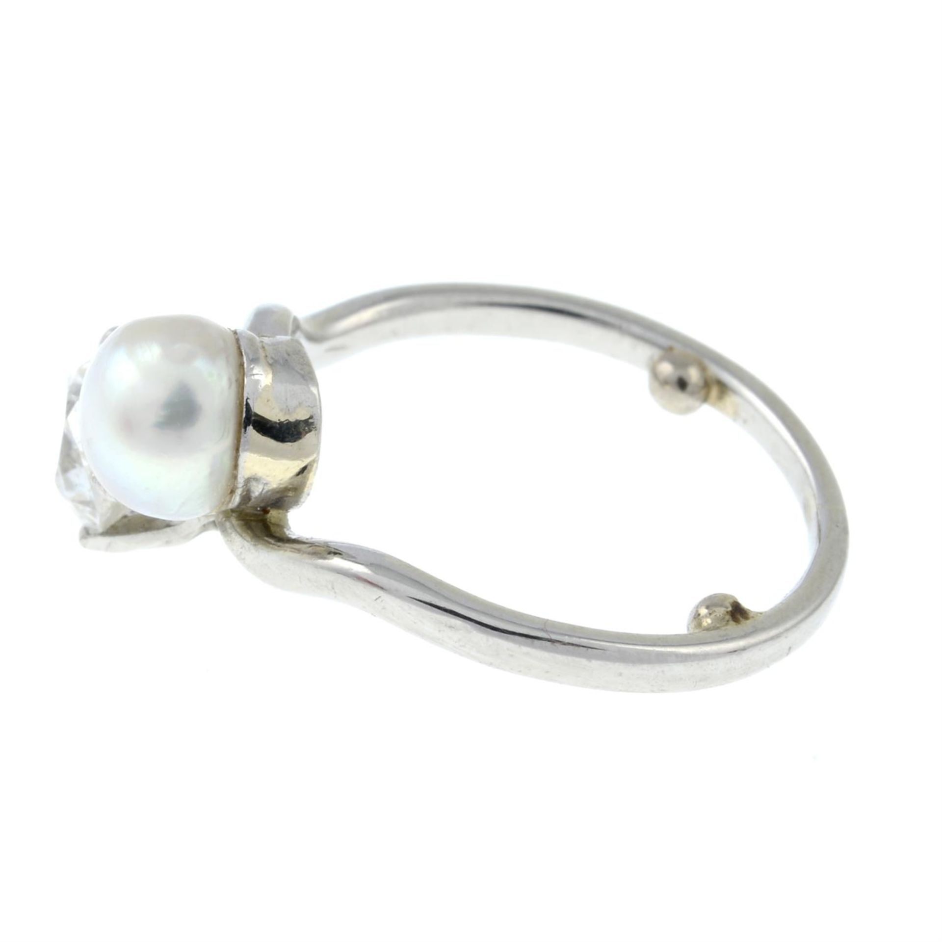 A mid 20th century platinum, old-cut diamond and cultured pearl crossover ring. - Image 4 of 6