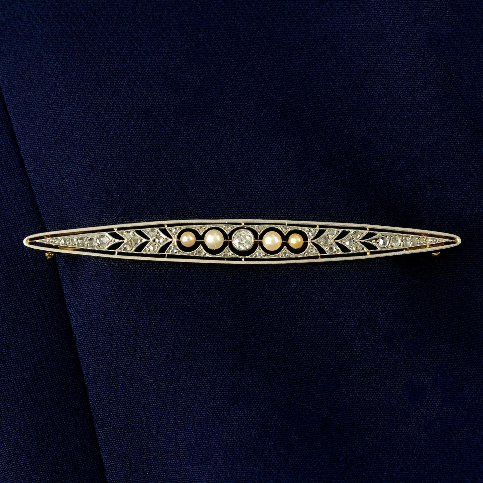 An early 20th century platinum and 18ct gold, diamond and seed pearl bar brooch.