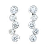 A pair of 18ct gold brilliant-cut diamond drop earrings.