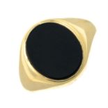 A 9ct gold onyx signet ring.