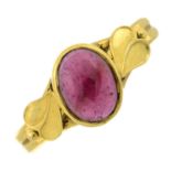 An 18ct gold garnet single-stone ring.