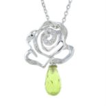 An 18ct gold pave-set diamond and peridot briolette pendant, with chain.