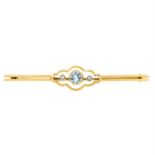 An early 20th century 15ct gold, aquamarine and split pearl bar brooch.