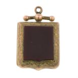 An early 20th century gold carnelian locket.