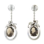 A pair of smoky quartz drop earrings.