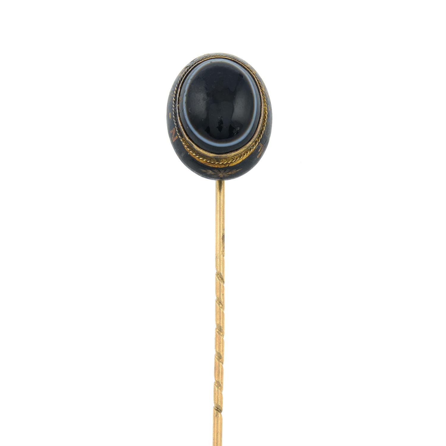 A late 19th century bulls-eye agate mourning stick pin. - Image 3 of 4