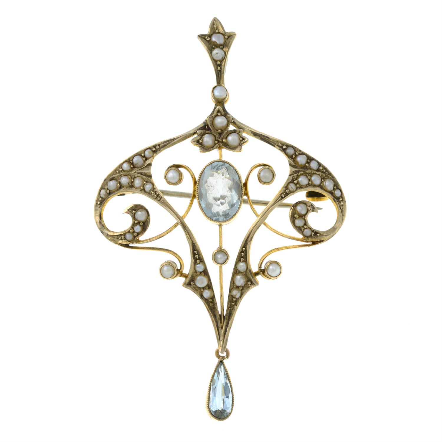 An early 20th century 9ct gold aquamarine and seed pearl pendant.