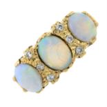 A 1980s 9ct gold opal cabochon and brilliant-cut diamond dress ring.