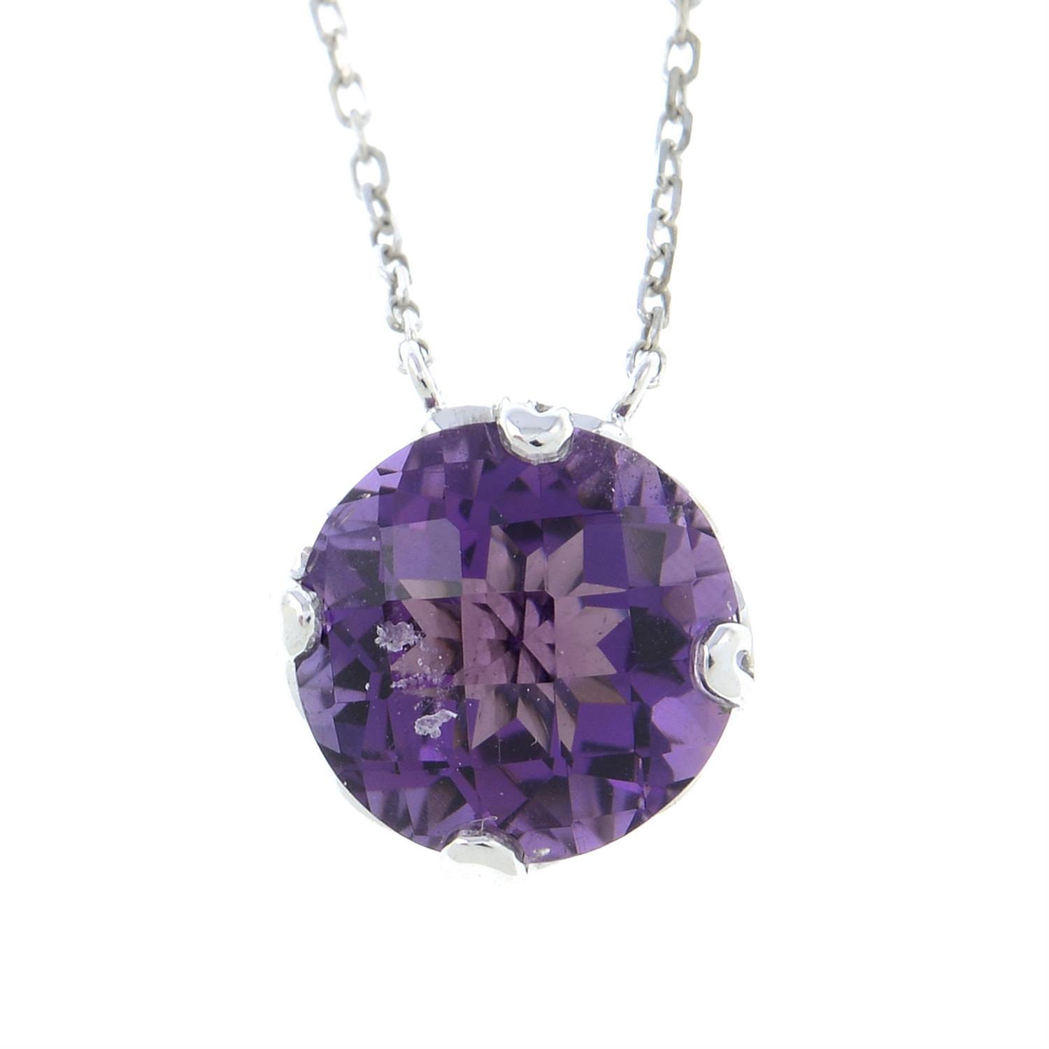 An 18ct gold amethyst single-stone pendant, with integral chain.