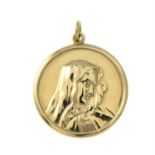 A 9ct gold Madonna pendant.
