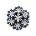 An 18ct gold sapphire and single-cut diamond cluster ring.