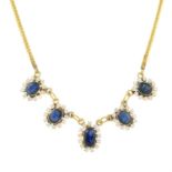 A sapphire and cubic zirconia cluster fringe necklace.
