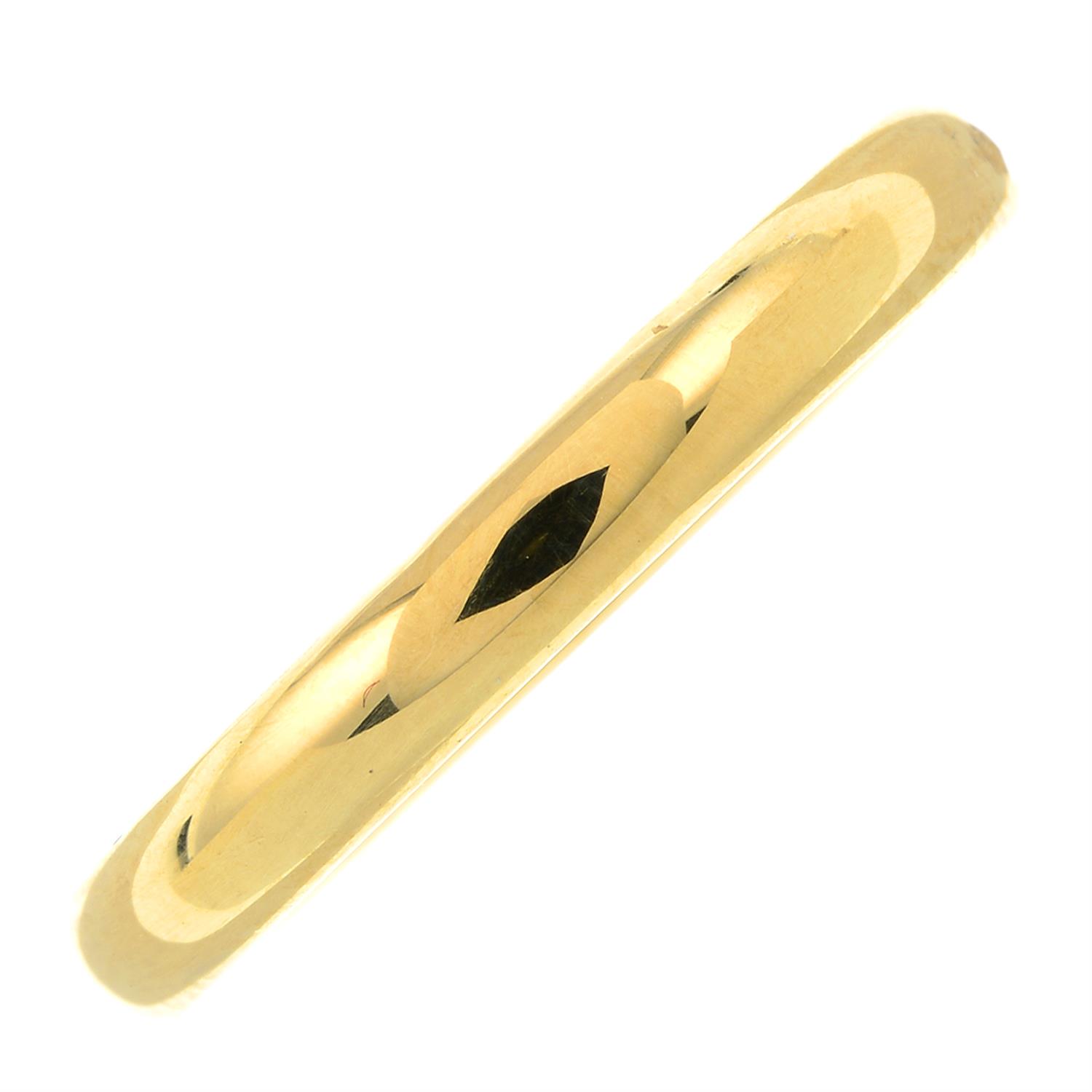 An 18ct gold band ring, with diamond highlights.