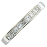 An 18ct gold square-shape diamond half eternity ring.