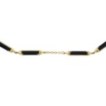 A 9ct gold onyx bracelet.