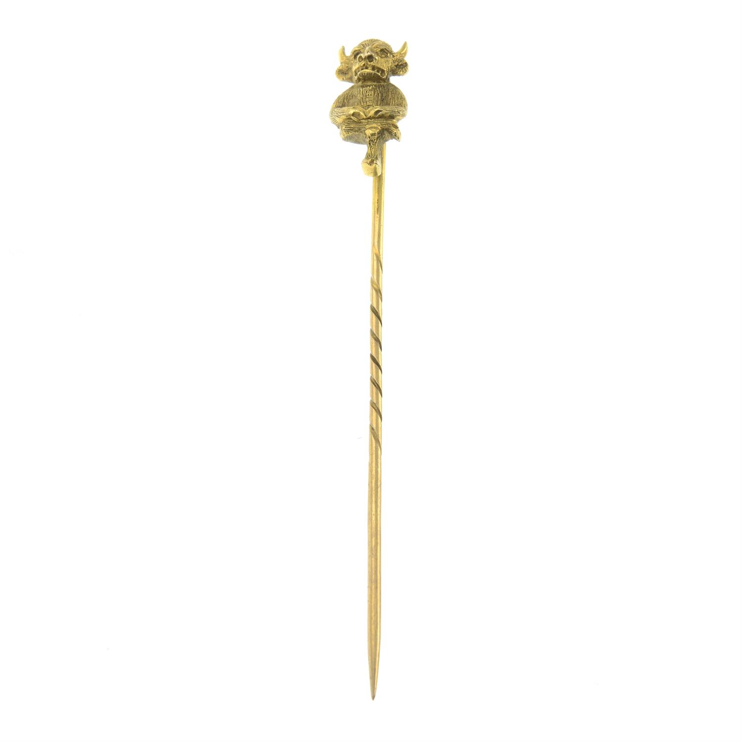 An early 20th century 9ct gold Lincoln Imp stick pin.