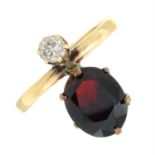 An old-cut diamond and garnet dress ring.