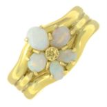 An opal cabochon floral cluster ring.