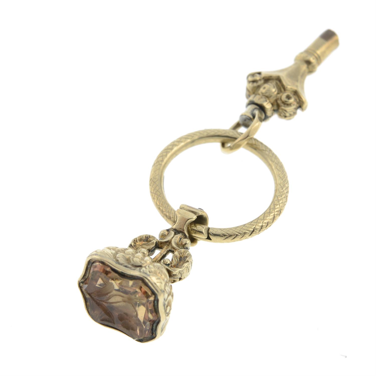 A mid 19th century 9ct gold split ring, suspending a fob and a watch key. - Image 4 of 4