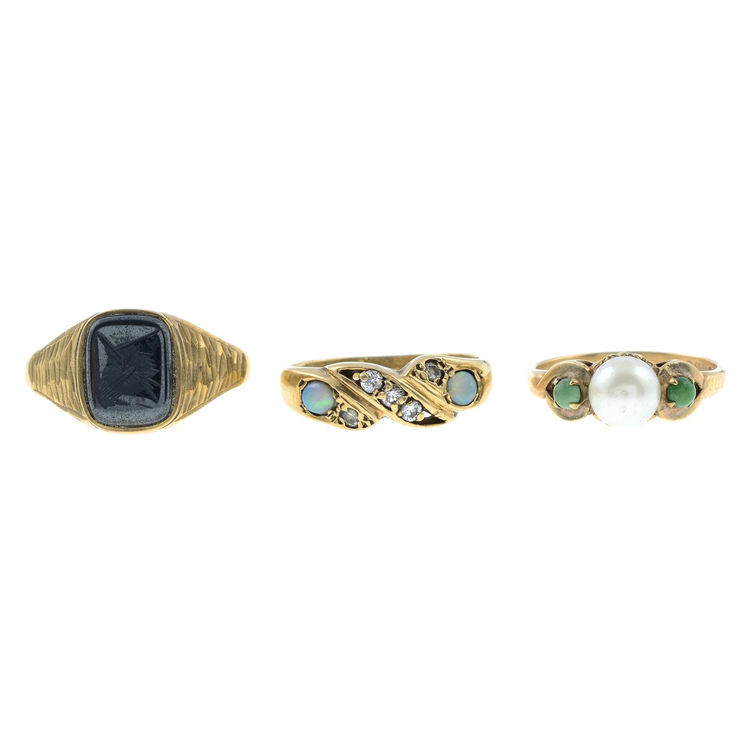 Three 9ct gold gem-set rings.