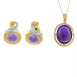 A pair of amethyst and diamond earrings and an amethyst pendant, suspended from a chain.