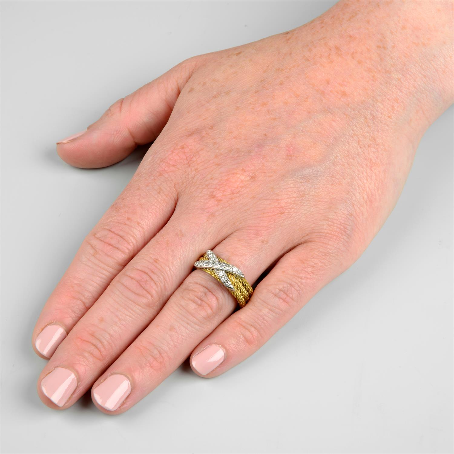 A rope-twist band ring, with pavé-set diamond cross highlight. - Image 10 of 10