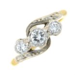 A mid 20th century 18ct gold and platinum brilliant-cut diamond three-stone ring.