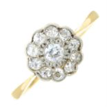 An early 20th century 18ct gold and platinum old-cut diamond cluster ring.