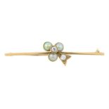 An early 20th century 15ct gold split pearl and old-cut diamond shamrock brooch.