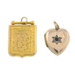 Two early 20th century gold locket pendants.