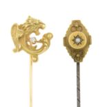 Two gem-set stickpins.