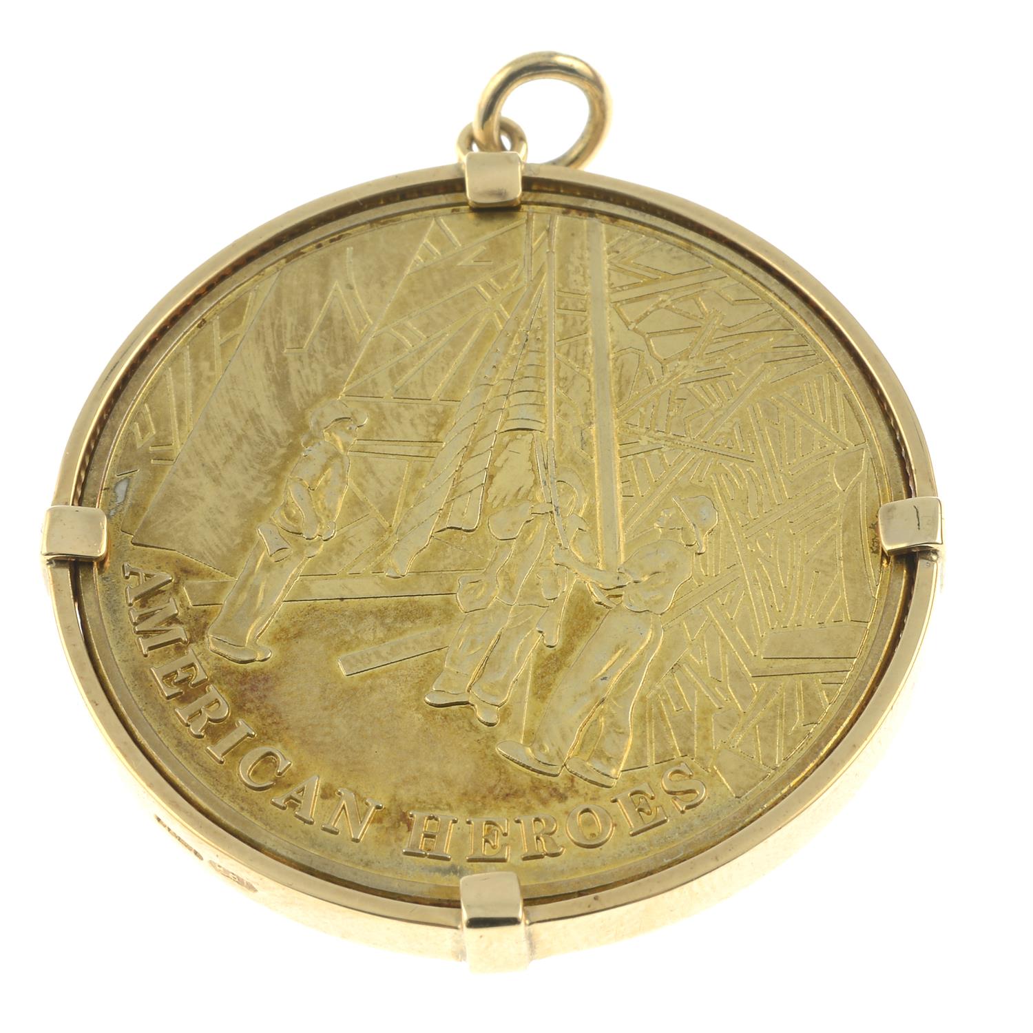 A '9-11 American Heroes' remembrance coin, within a 9ct gold pendant mount. - Image 2 of 2
