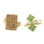 Two gold gem-set rings.