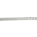 A brilliant-cut diamond line bracelet.