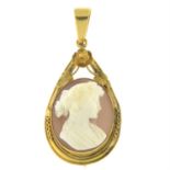 An early 20th century gold shell cameo pendant, carved to depict a lady in profile.