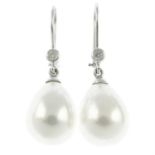 A pair of imitation pearl and diamond drop earrings.