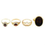 Four 9ct gold gem-set rings.