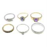 Six 9ct gold diamond and gem-set rings.