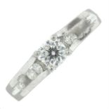 A platinum brilliant-cut diamond dress ring.