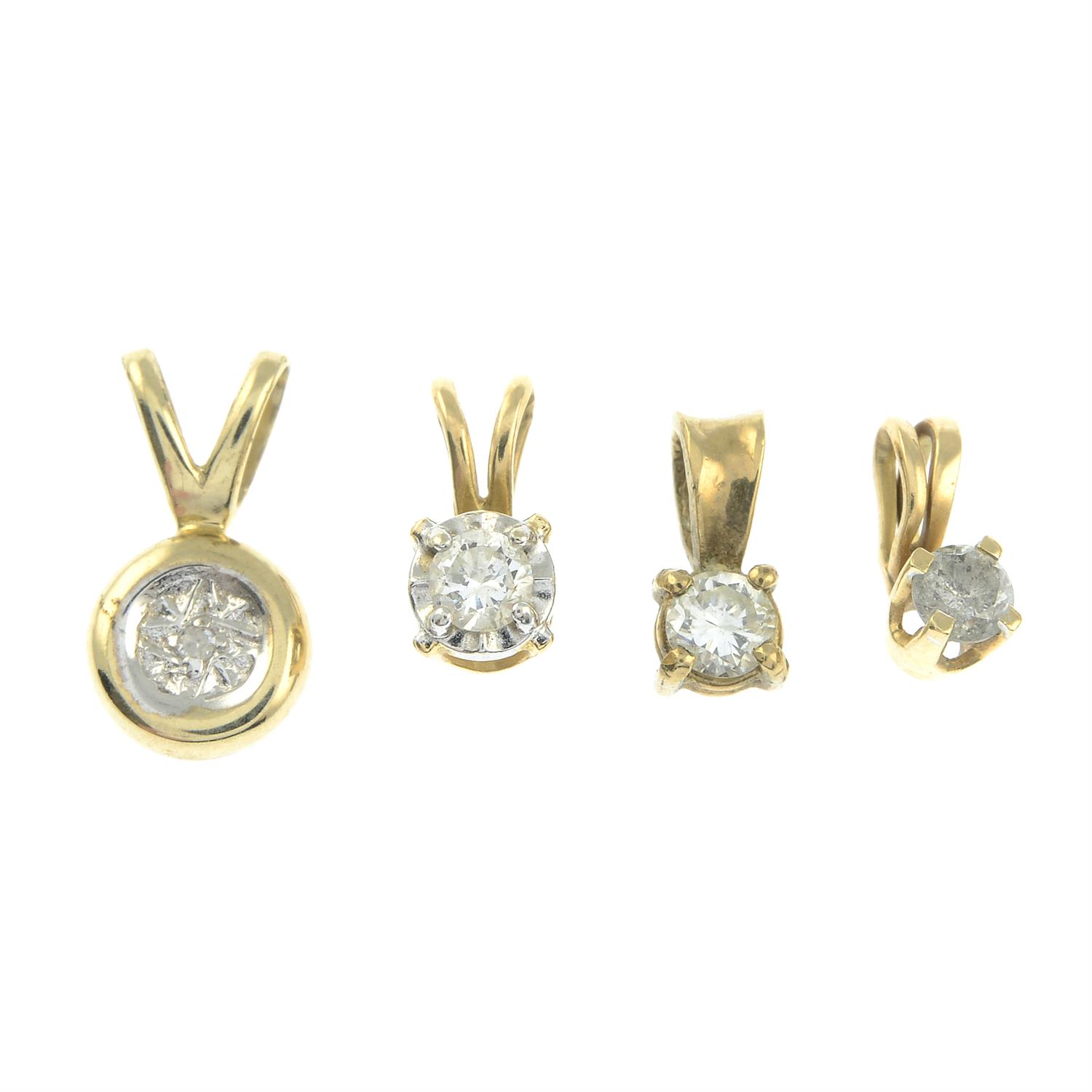 Four diamond pendants.