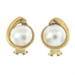 A pair of mabé pearl and diamond earrings.