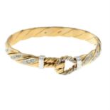 A 9ct gold diamond bangle.