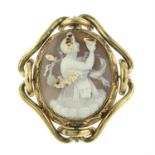 A mid 19th century shell cameo brooch, carved to depict Bacchus.