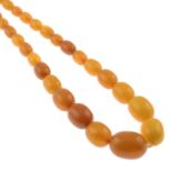 An amber single-strand necklace.