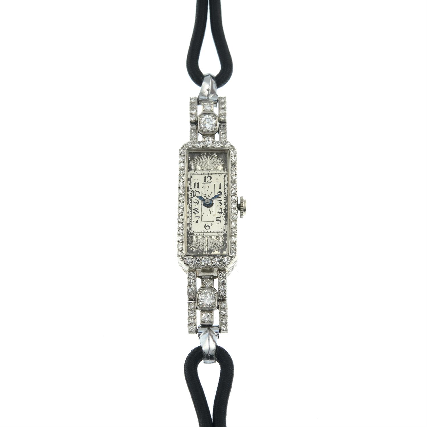 A lady's early 20th century gold single and brilliant-cut diamond wristwatch, with bracelet