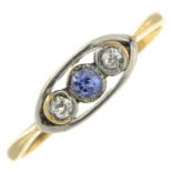 An early 20th century diamond and sapphire three-stone ring.