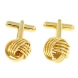 A pair of knot cufflinks.