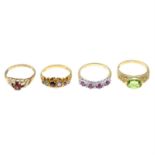 Four 9ct gold gem-set rings.